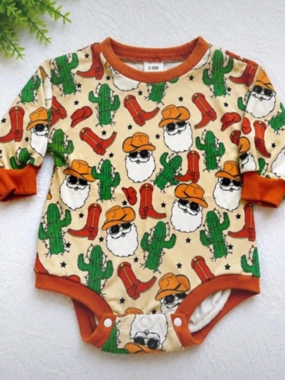 Cream Cowboy Cactus Long-Sleeve Bodysuit with Orange Trim